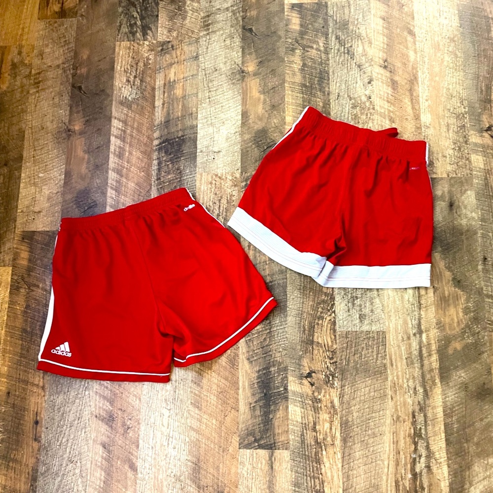 Two Adidas athletic shorts